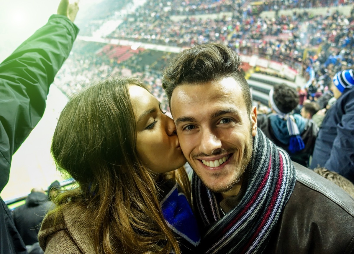 Couple at a sporting event