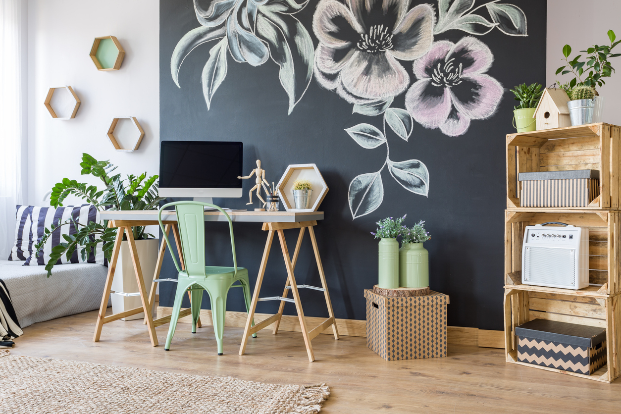 Home workspace with chalkboard, diy, regale, desk, chair and computer