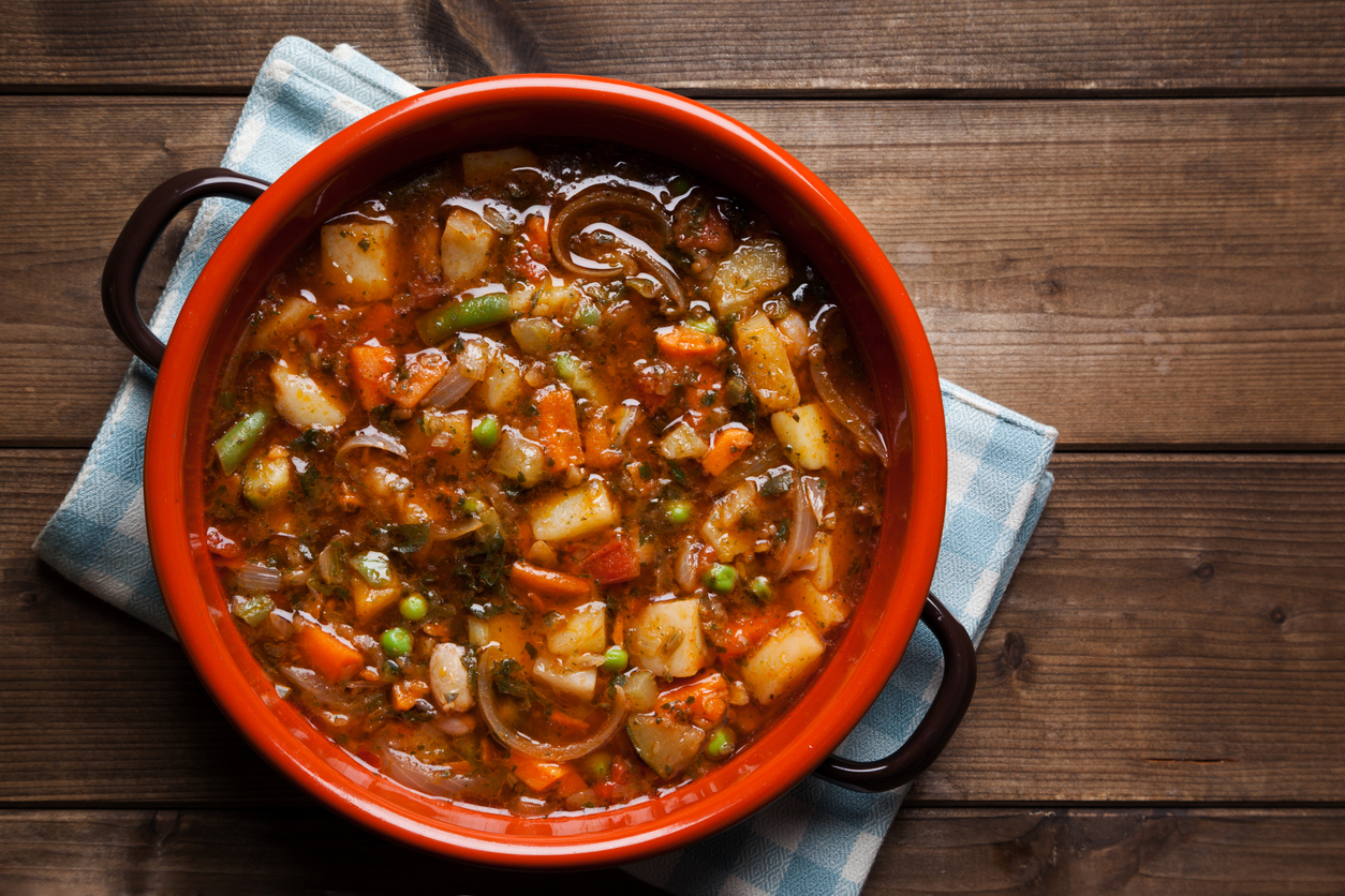 Traditional Italian cuisine minestrone soup prepared on the pot