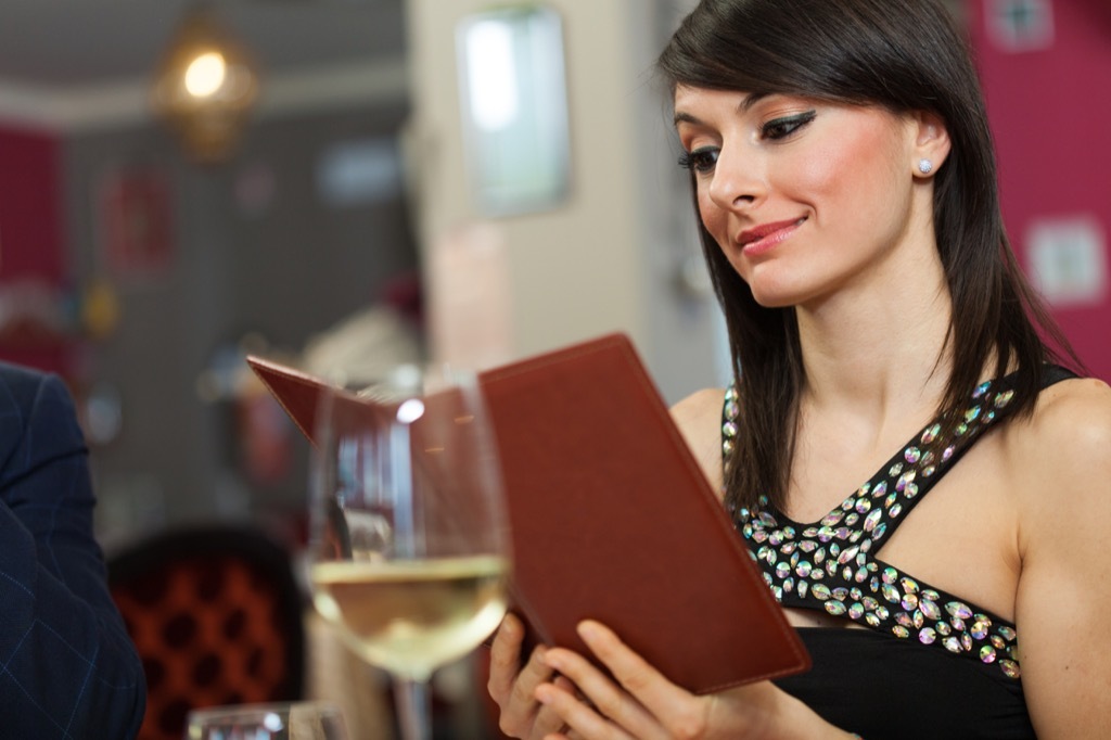 Woman looking at menu