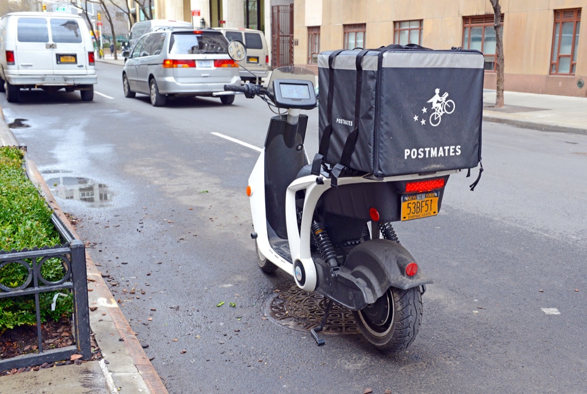 postmates bike sitting in the street