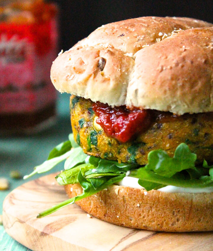 Vegan curried sweet potato burger with tomato chutney and cilantro aioli