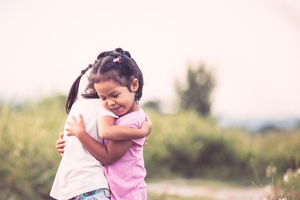 two children hugging