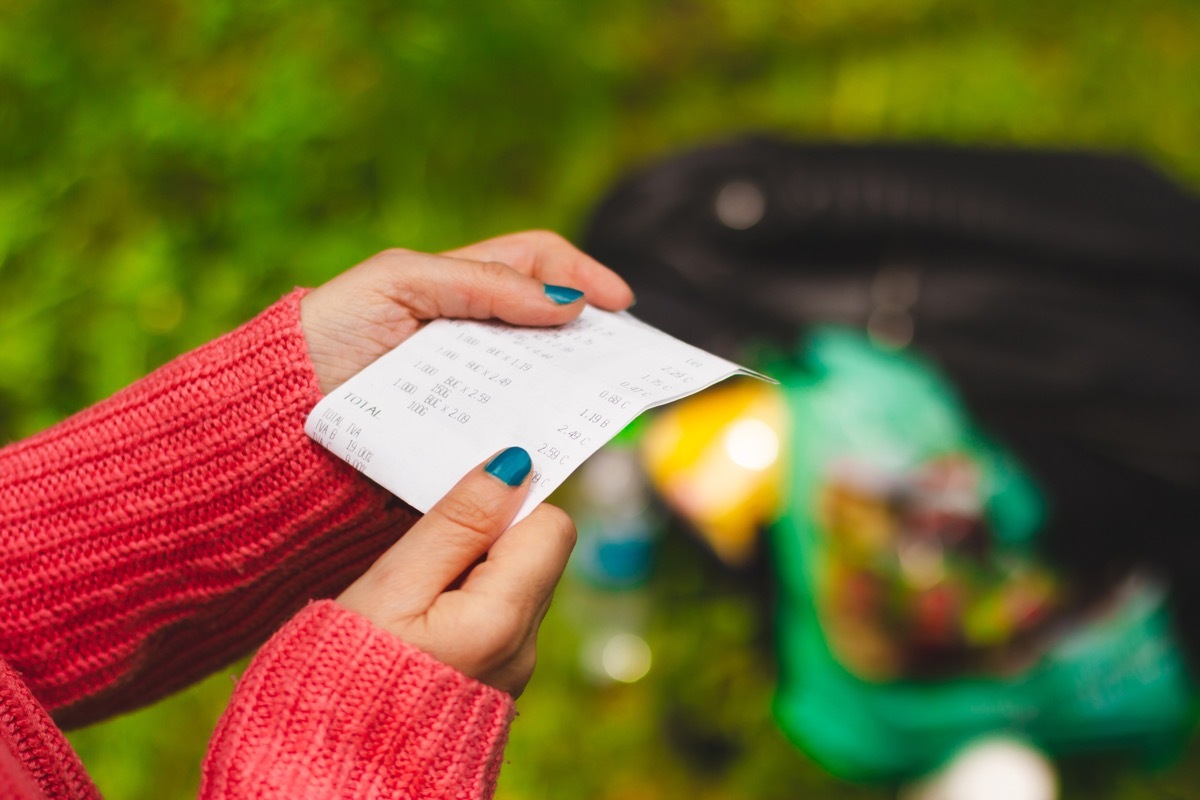 looking at receipt