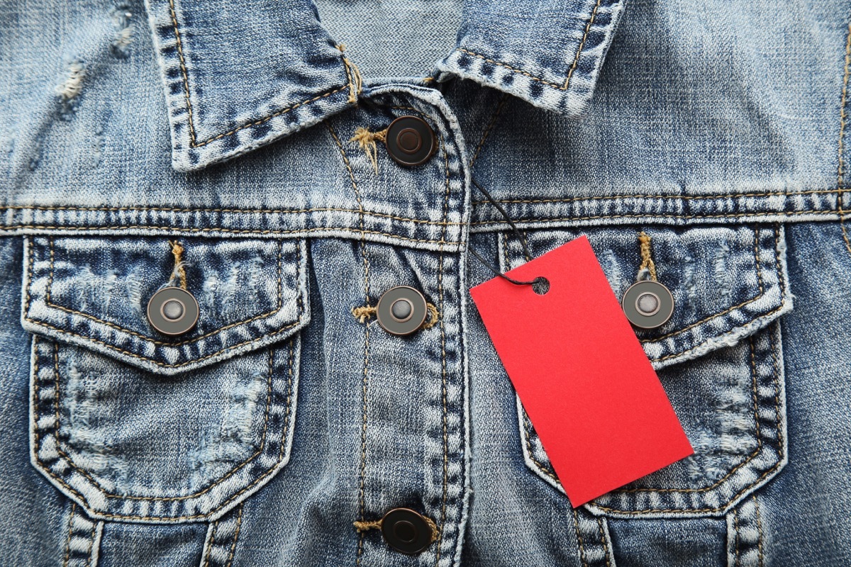 Red sale tag with jeans jacket - Image