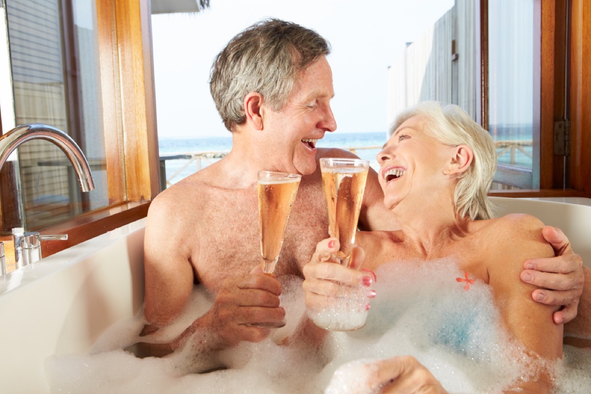 older couple in bubble bath, healthy sex after 40