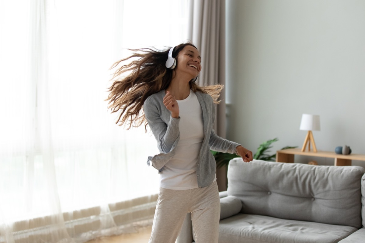 Girl having a dance break at home