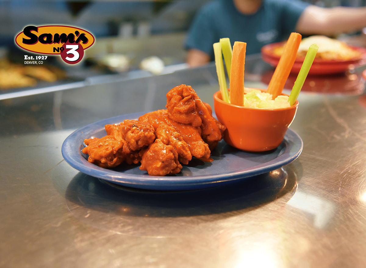 buffalo wings with coleslaw and celery and carrot sticks