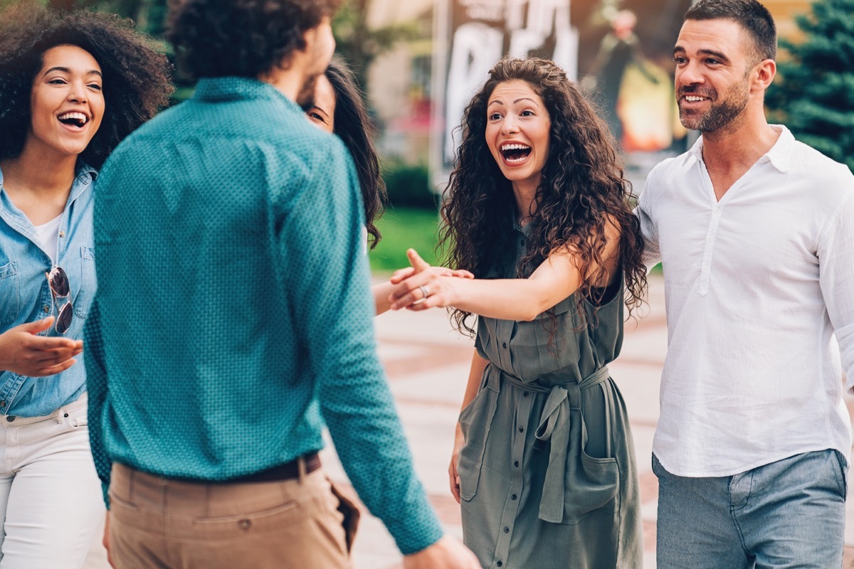 group of friends having fun outdoors in the city