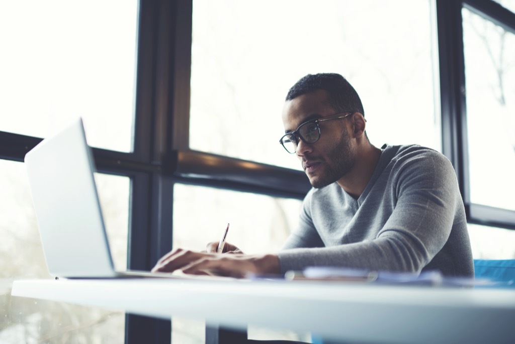 man on computer