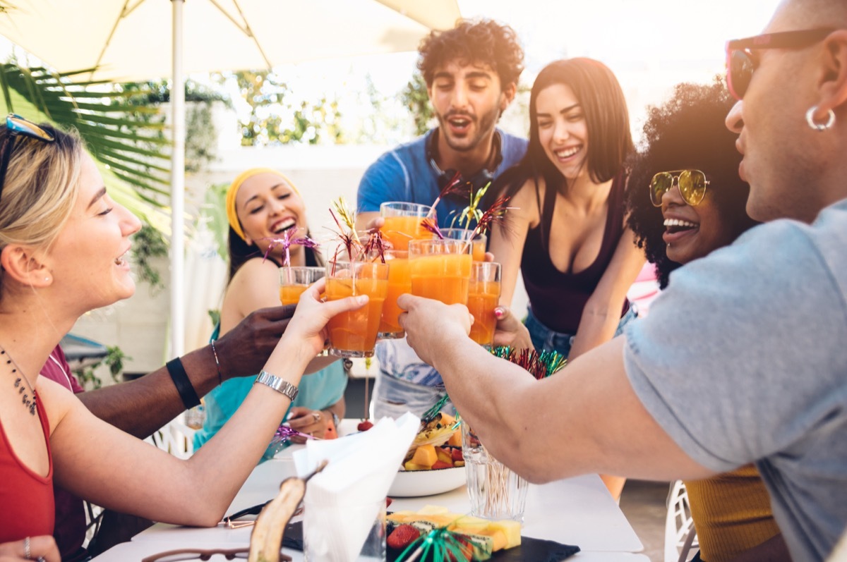 Friends cheers at brunch