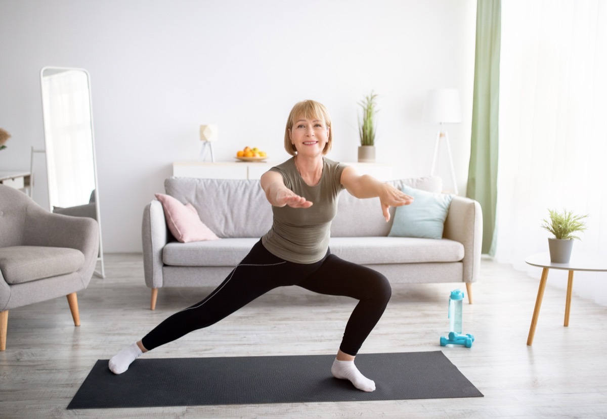 Older Woman Stretching in Leggings