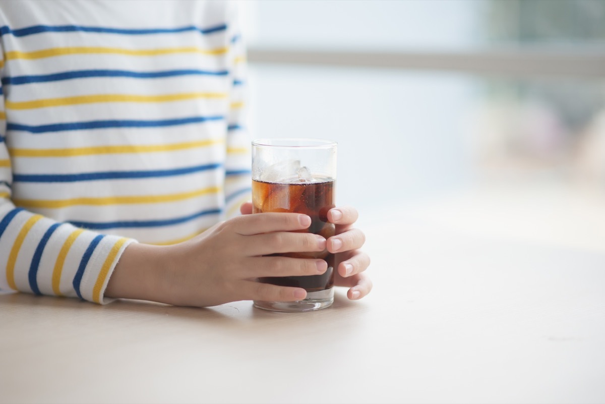 boy drinking soft drink cola soda