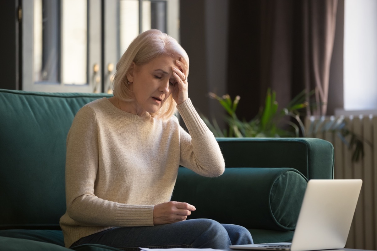 Woman experiencing fatigue at home