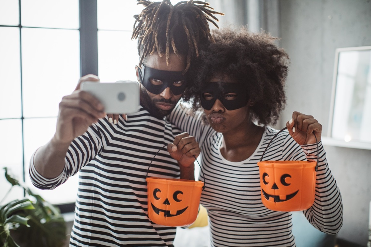 Young couple celebrating Halloween