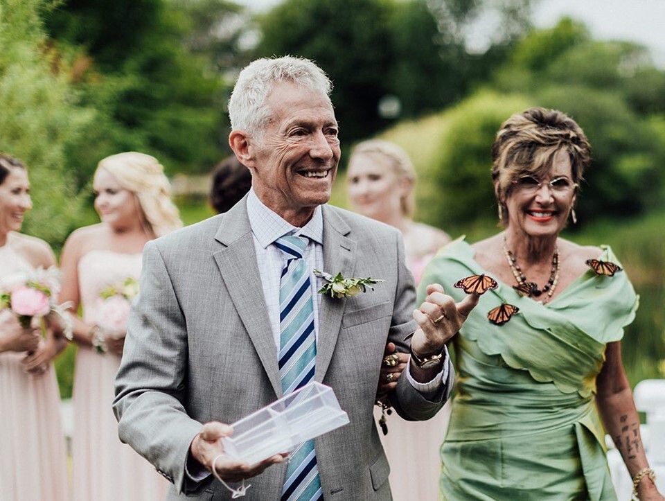 family releases butterflies to honor late sister at wedding