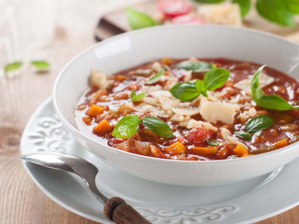 minestrone soup in white bowl