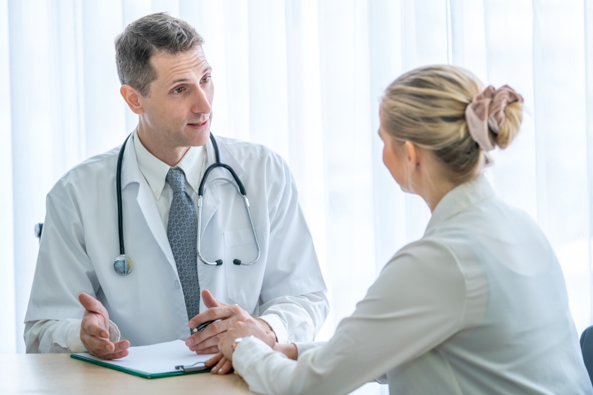 Woman Talking to Doctor