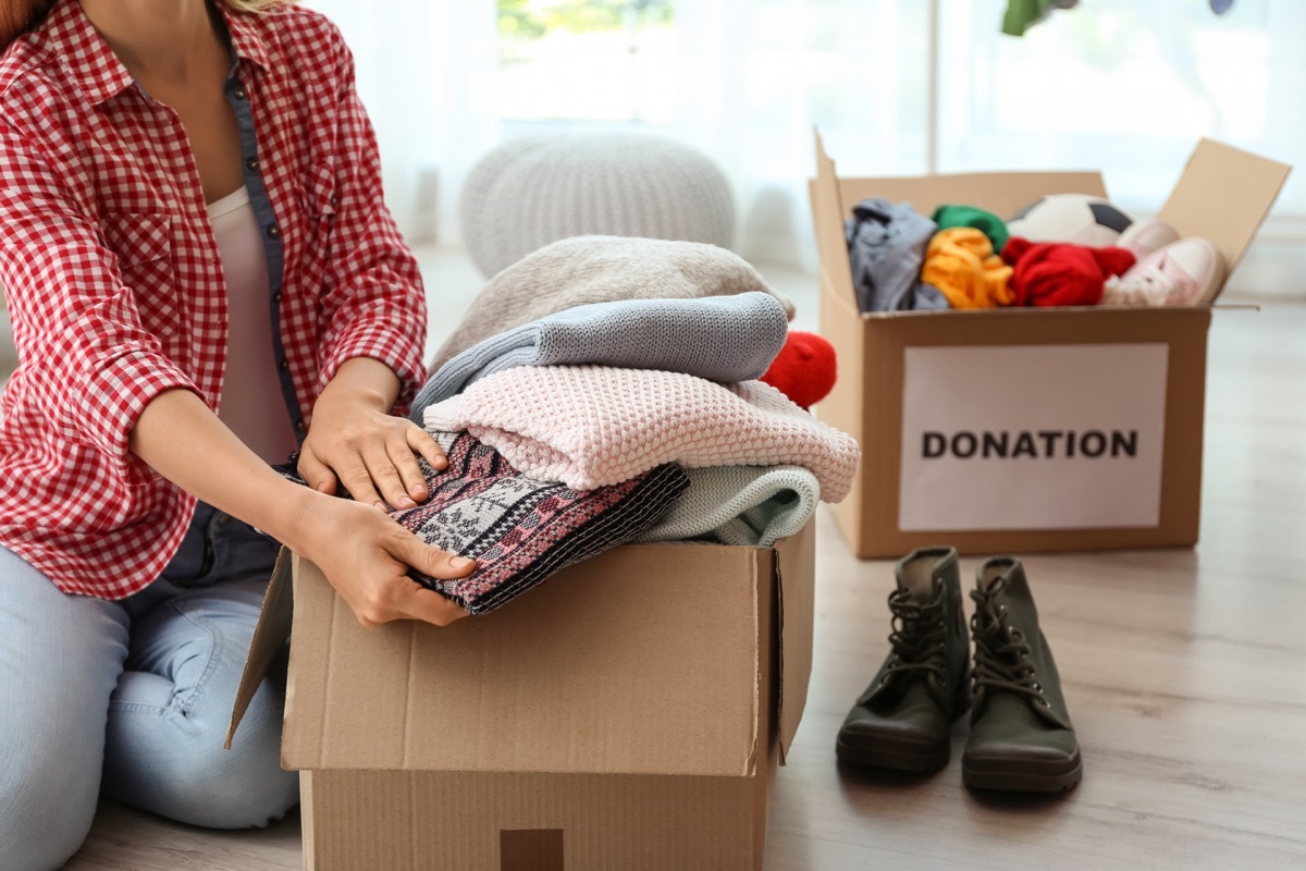 woman clearing out clutter