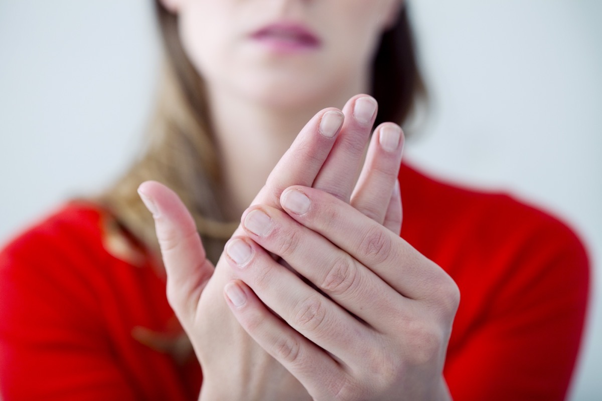 Woman suffering from hand pain