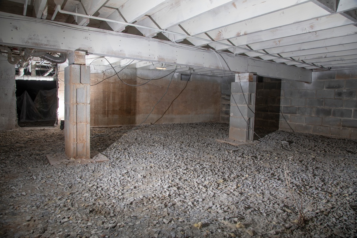 crawl space with cinderblock walls