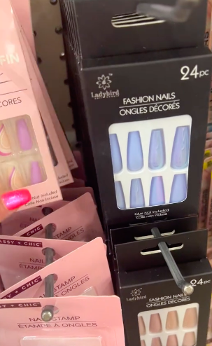 still from TikTok of fake nails being sold at Dollar Tree