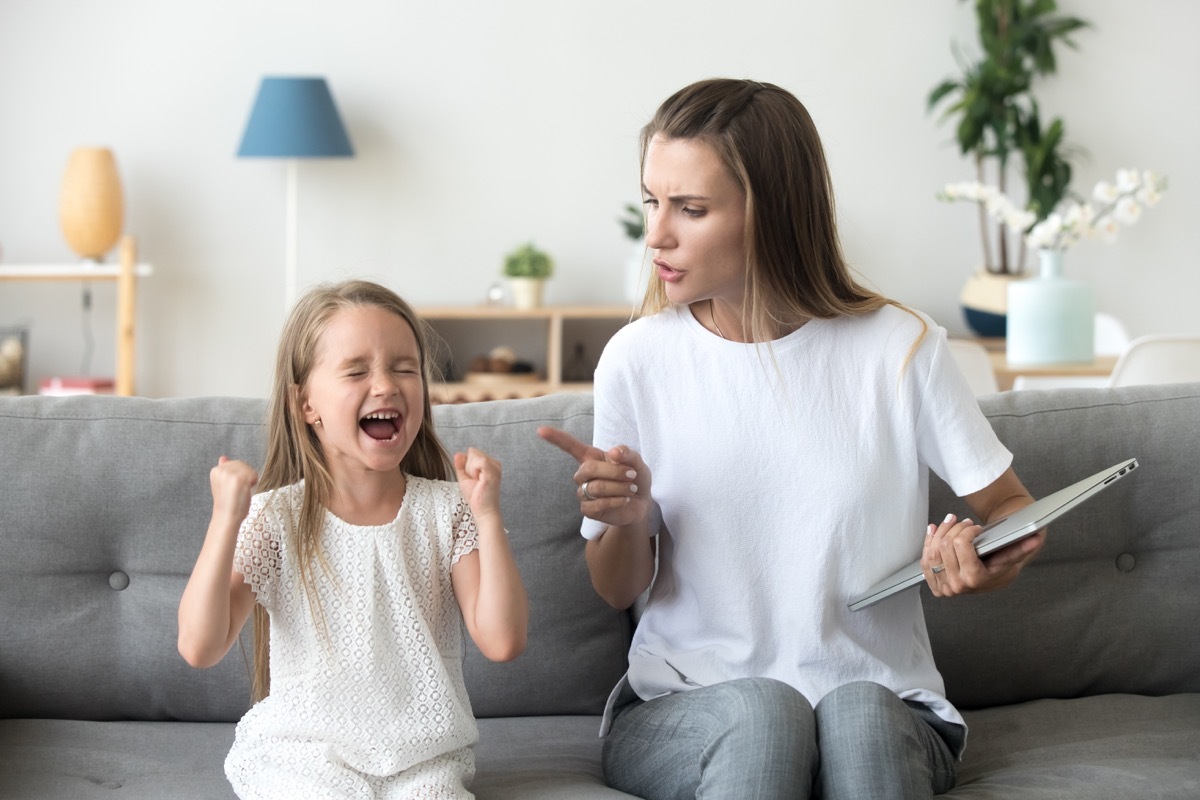 mother lecturing daughter