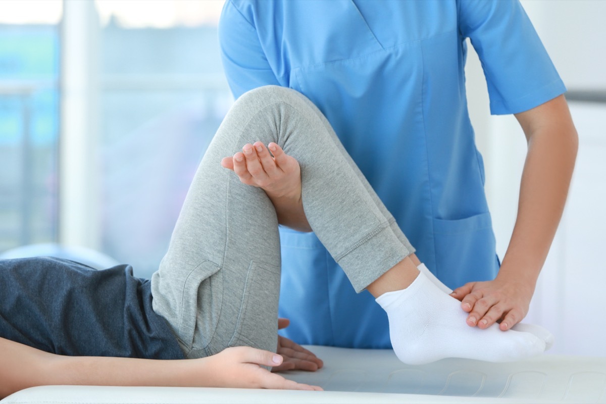 Woman Getting Her Legs Stretched During Physical Therapy Stop Lying to Your Doctor