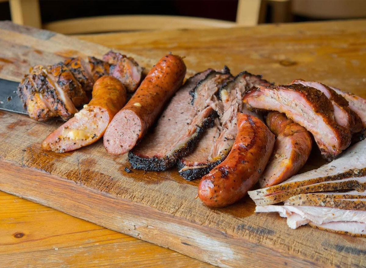 brisket and hot links on serving board