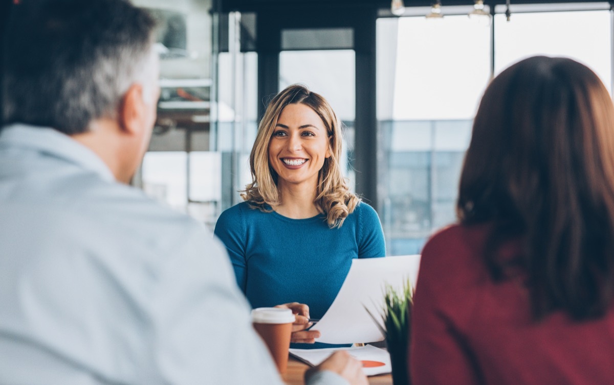 young woman talking to employers