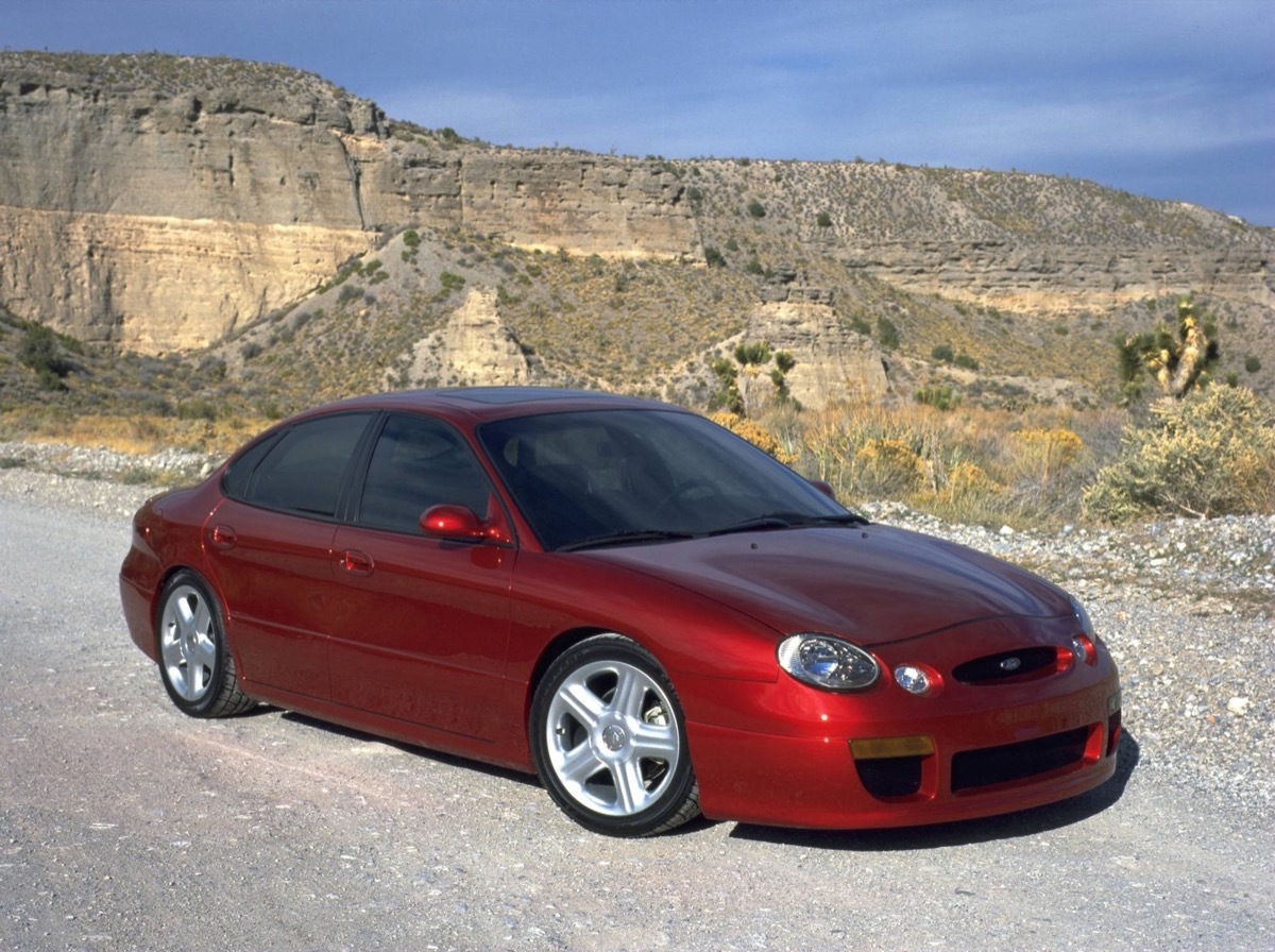 A red Ford Taurus