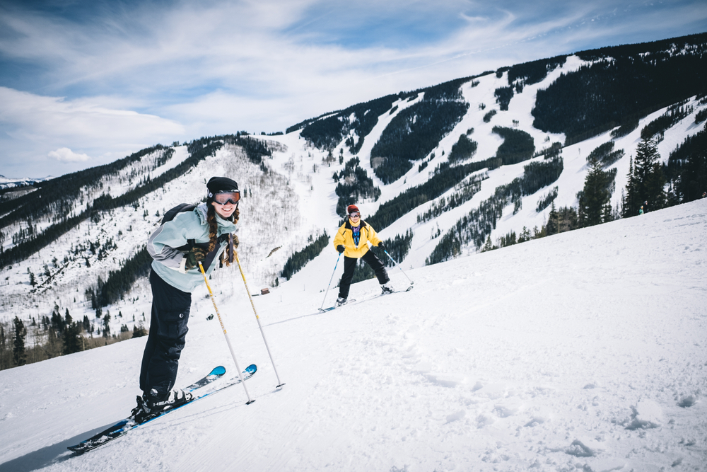 Two skiers on a slope