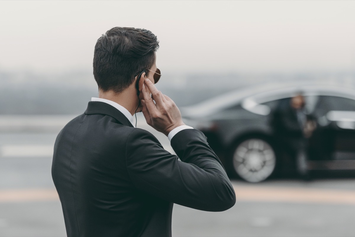 Male bodyguard on tarmac