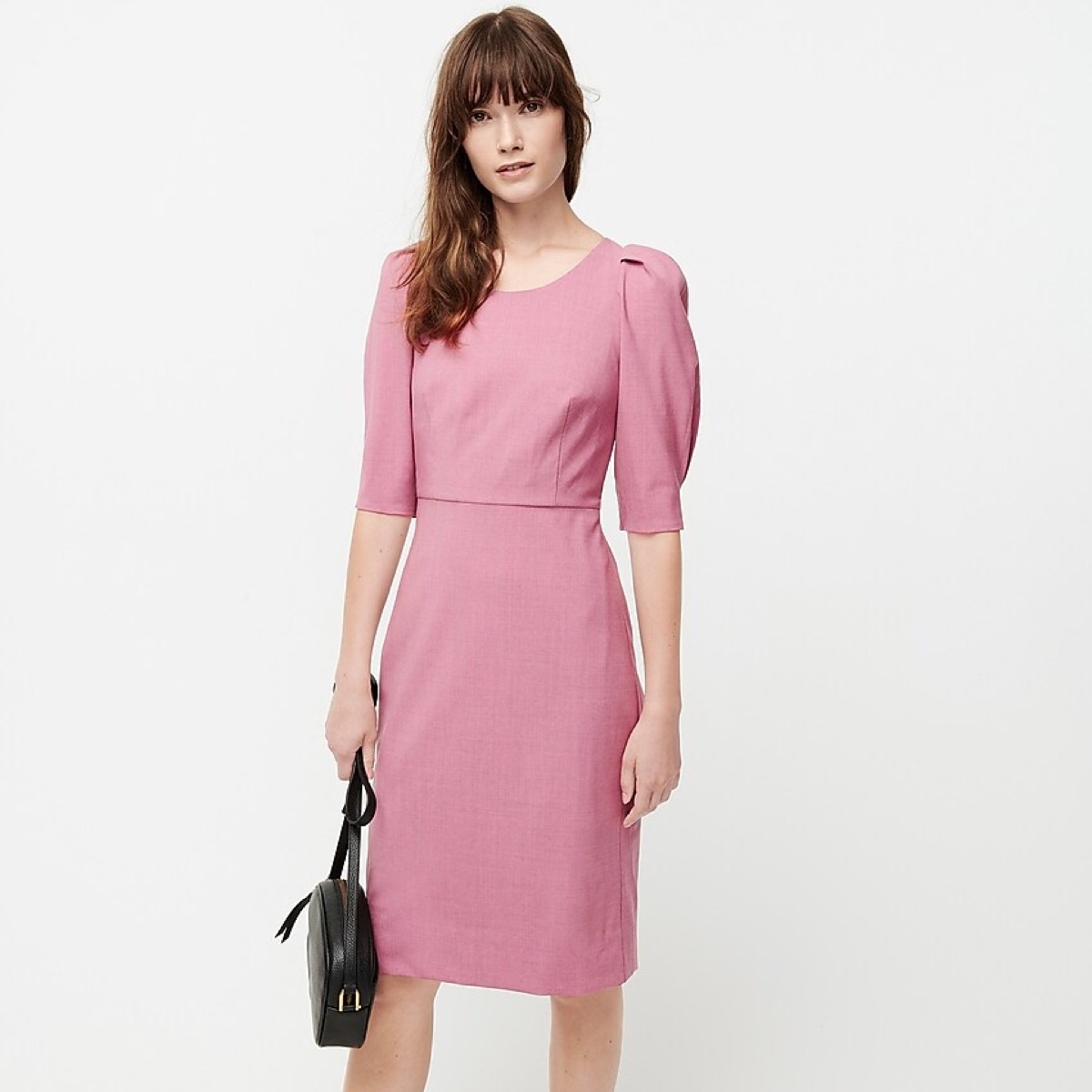 woman in pink puff sleeve dress