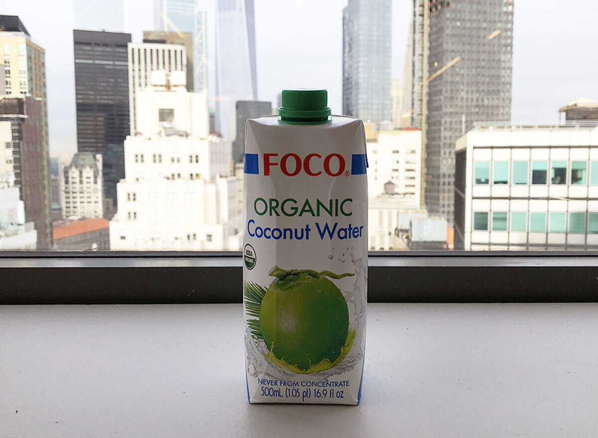 foco organic coconut water bottle by window