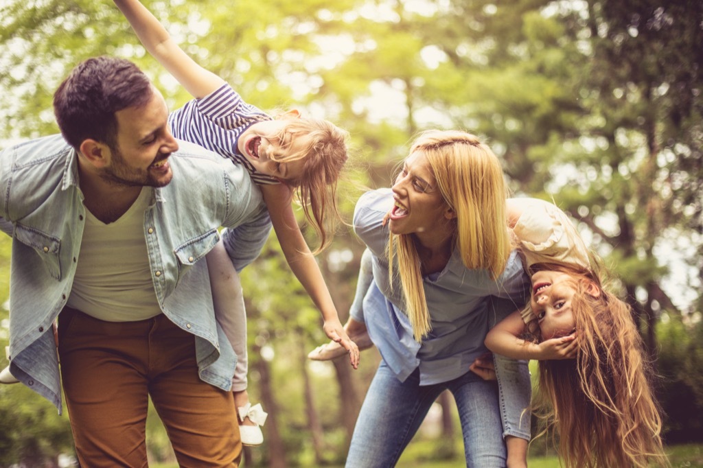 Happy family smiling lies over 40