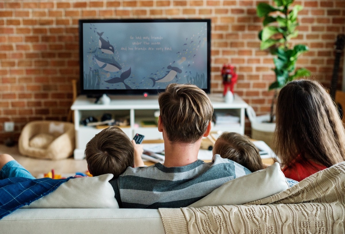 family watching a movie together for father's day