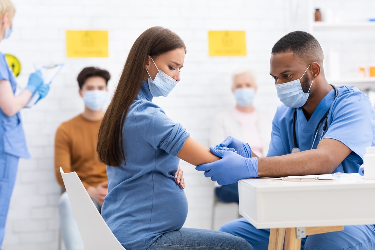 Pregnant woman getting COVID vaccine