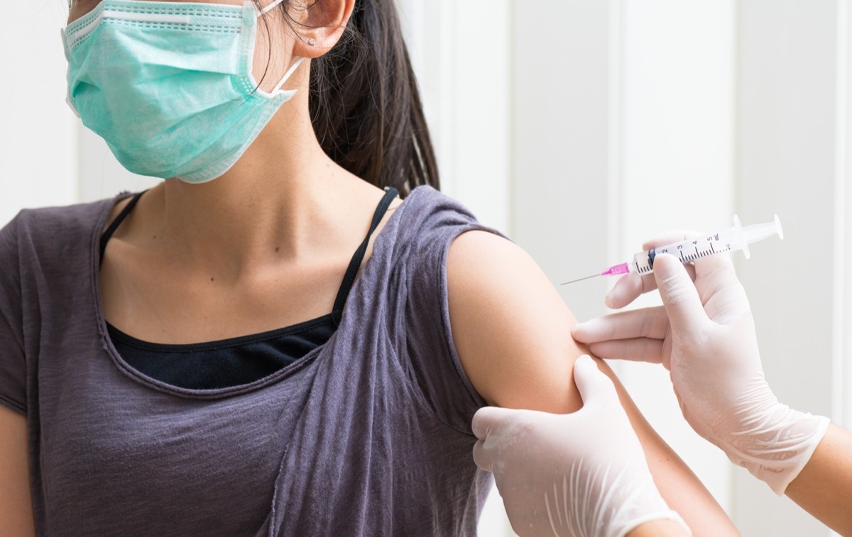 Woman getting COVID vaccine