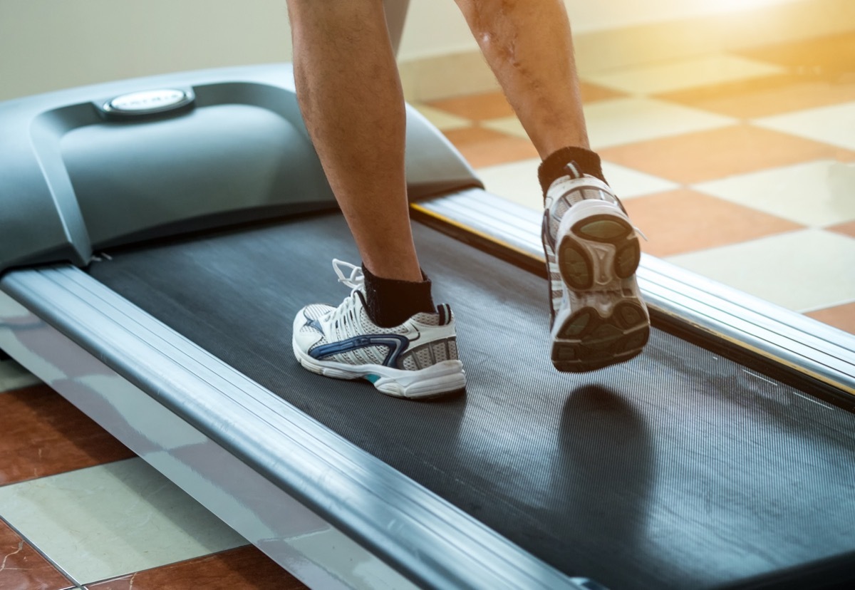 Man running on the treadmill at the gym