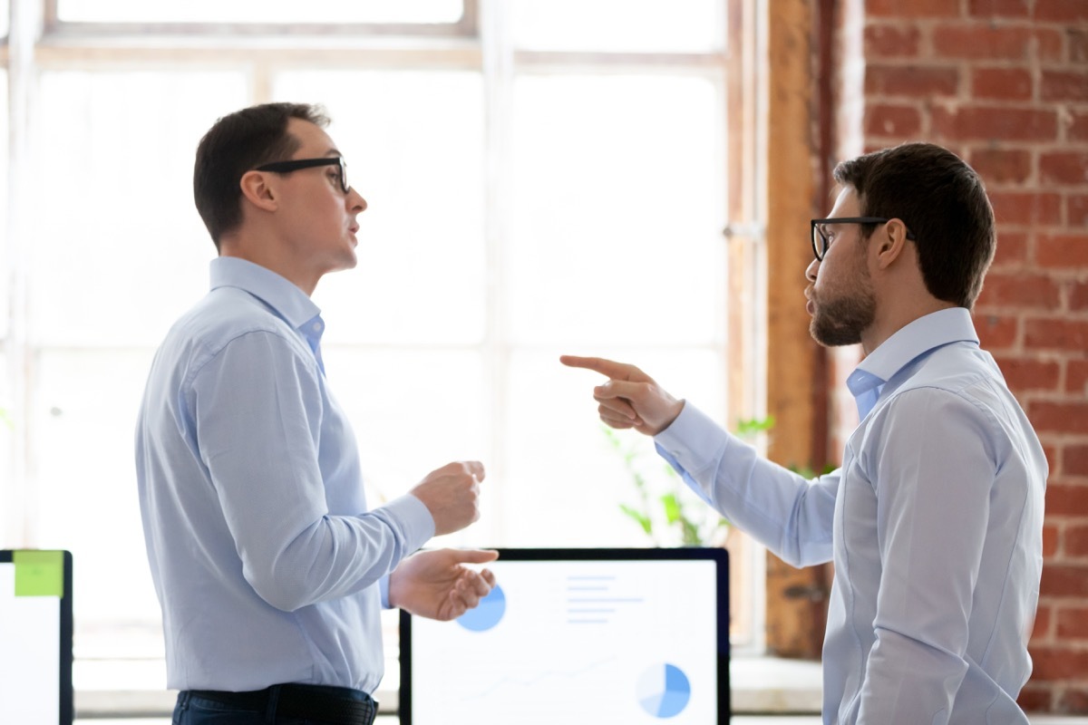 two male colleagues arguing