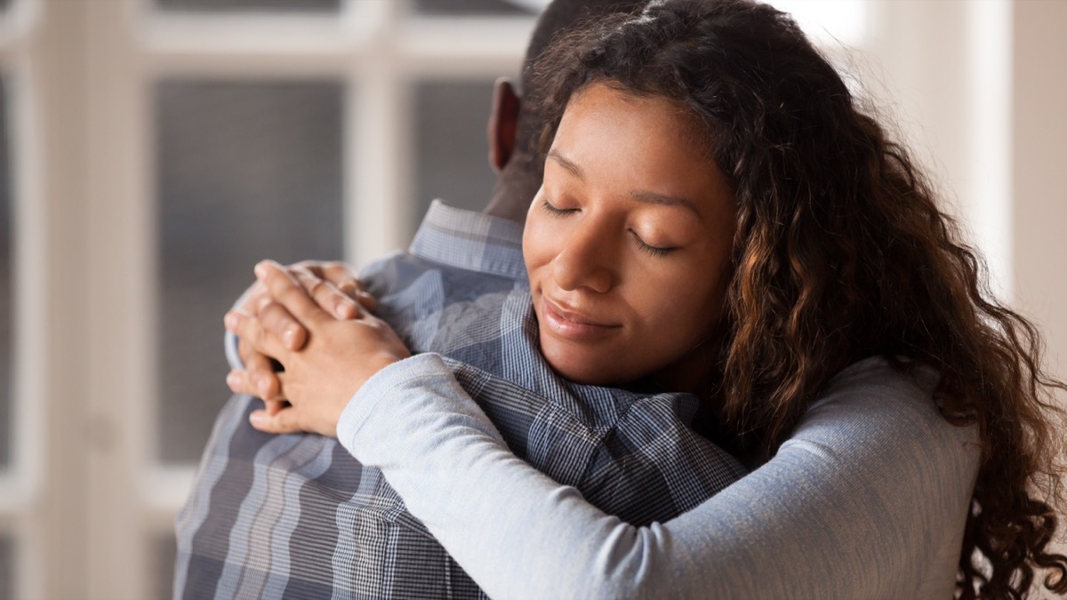 couple hugging and finding forgiveness