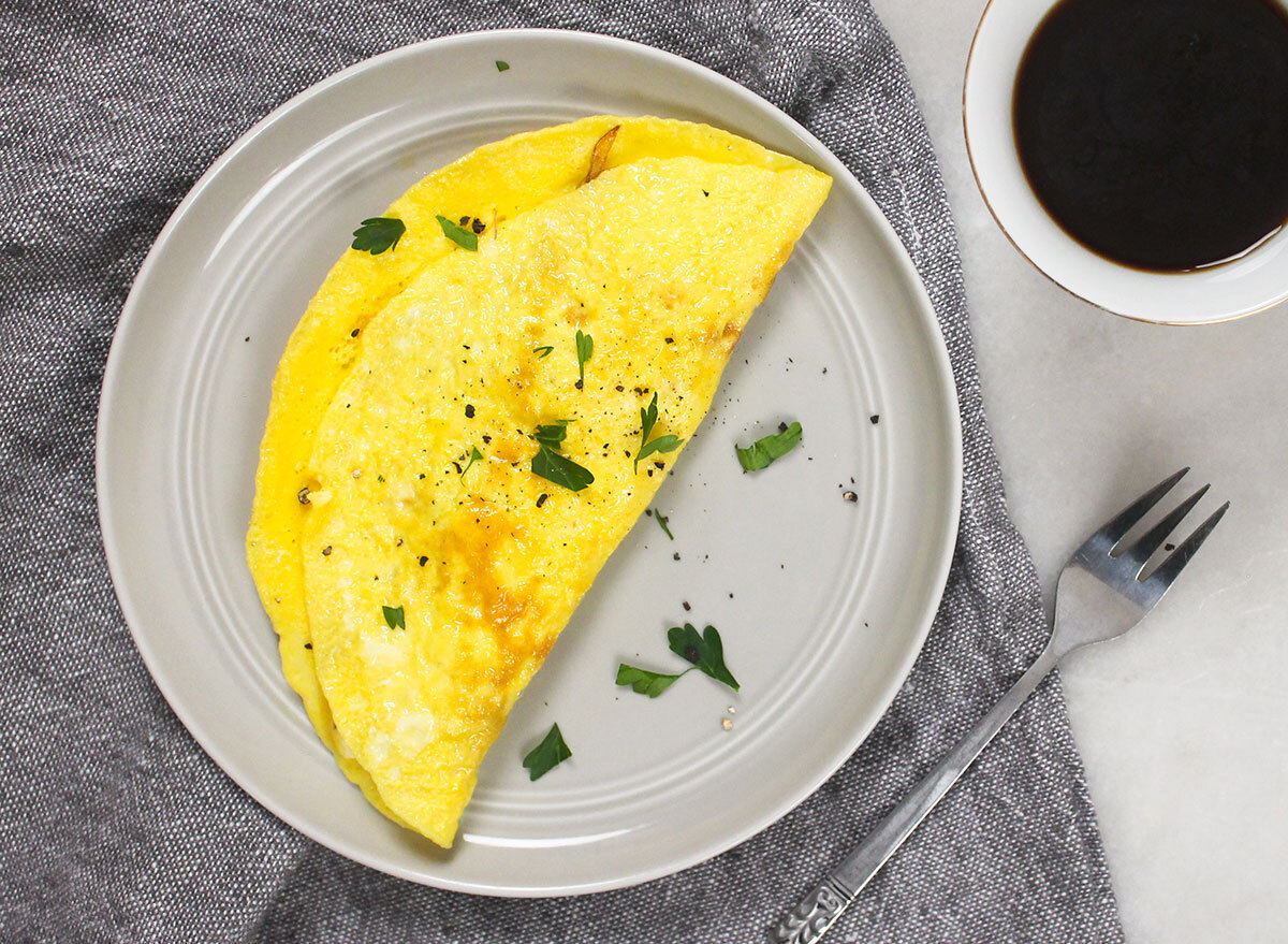 omelet sprinkled with salt pepper and parsely