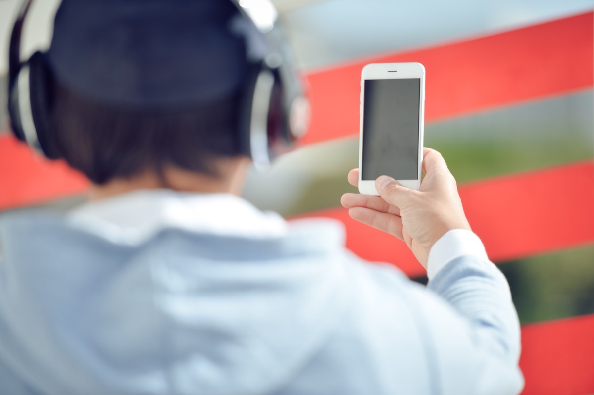 Man Filming and Taking Photographs With His Phone Police Officer Secrets