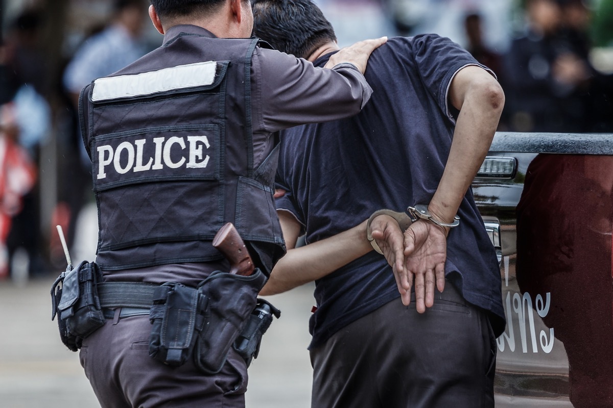 Person being arrested by cop