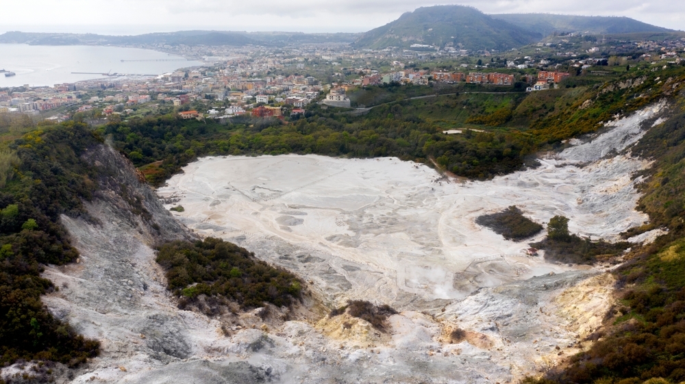 Aerial view of Campi Flegrei volcano in Italy with the town in the background