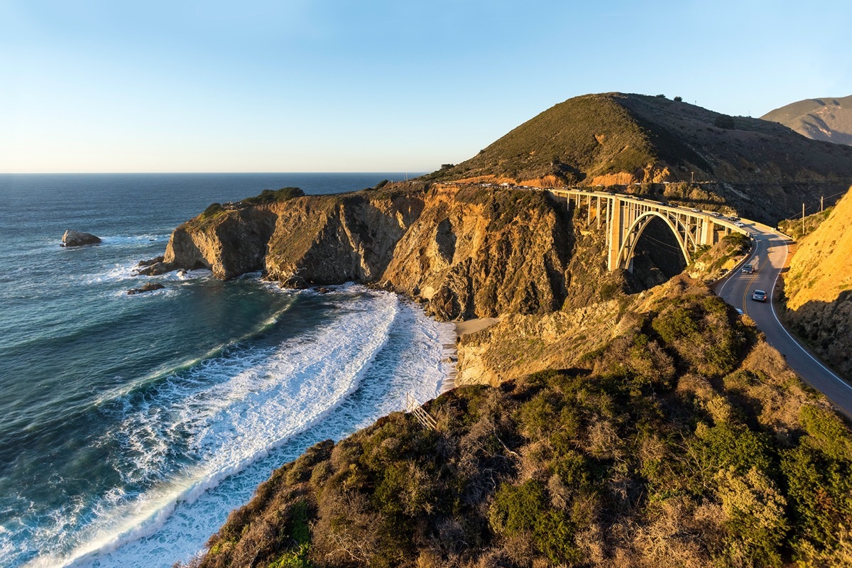 bridge between two cliffs along a coastline