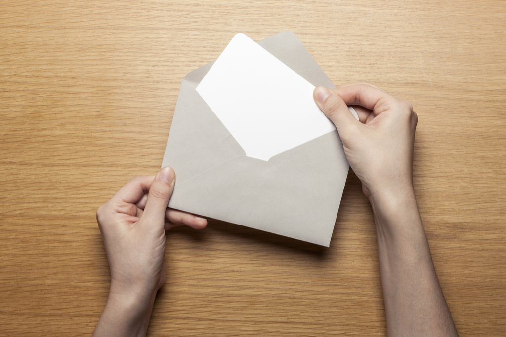 woman opening a card