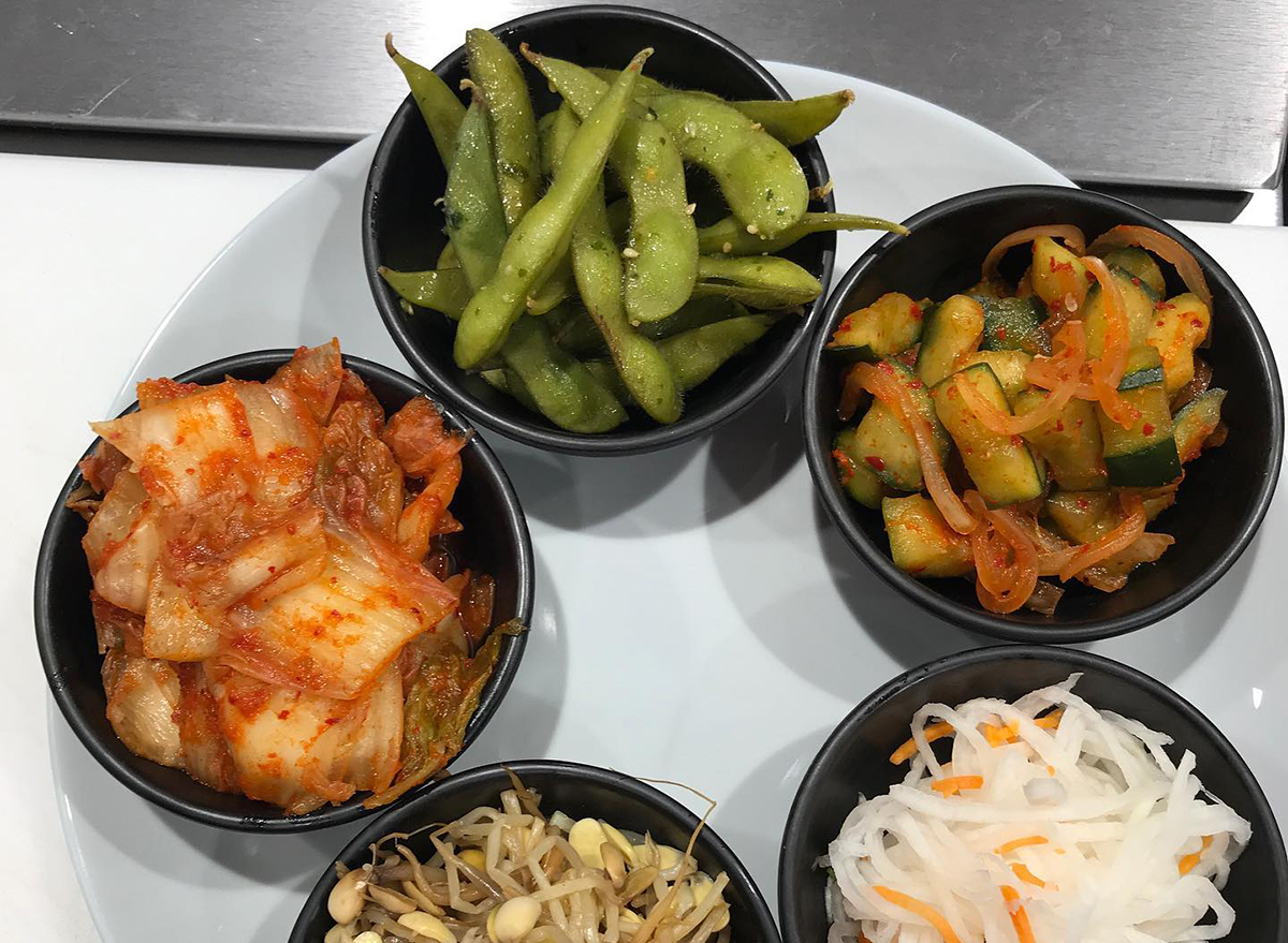 bowls of kimchi and edamame