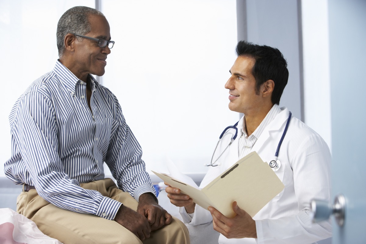 Man talking to his doctor